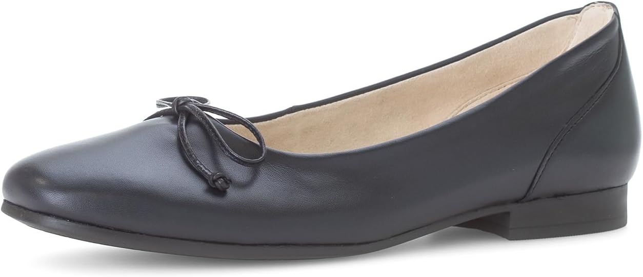 Pavo Monitor Arm installed on a modern office desk