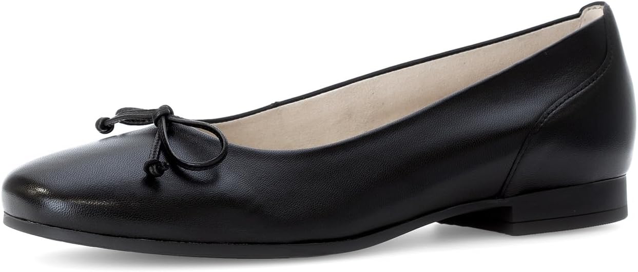 Pavo Monitor Arm installed on a wooden office desk