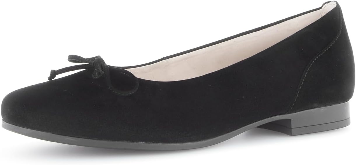 Pavo Monitor Arm installed on a wooden office desk